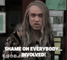 A Man With Long Hair Is Making A Funny Face And Saying `` Shame On Everybody Involved ! '' GIF