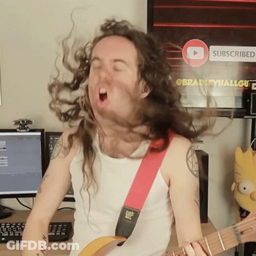 A Man With Long Hair Is Playing A Guitar In Front Of A Subscribe Button GIF