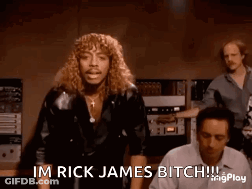 A Man With Long Hair Is Saying Im Rick James Bitch .. GIF