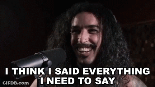 A Man With Long Hair Is Singing Into A Microphone And Says `` I Think I Said Everything I Need To Say '' GIF