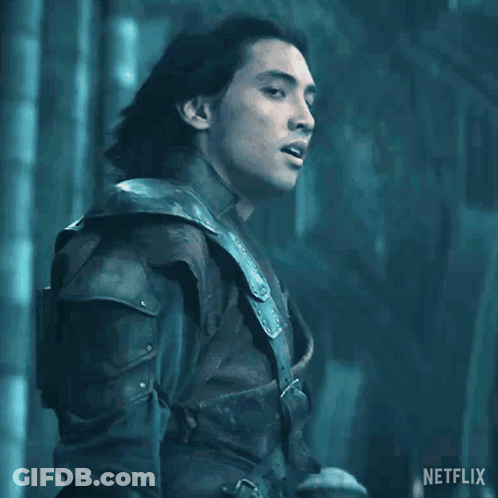 A Man With Long Hair Is Standing In Front Of A Sign That Says " Kill Them All " GIF