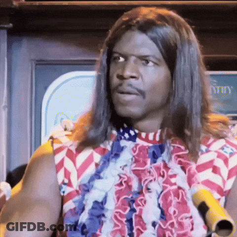 A Man With Long Hair Is Wearing A Red White And Blue Shirt And A Lei . GIF
