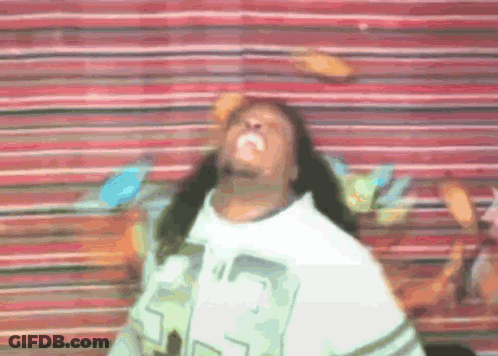 A Man With Long Hair Is Wearing A White Shirt With The Number 23 On The Front GIF
