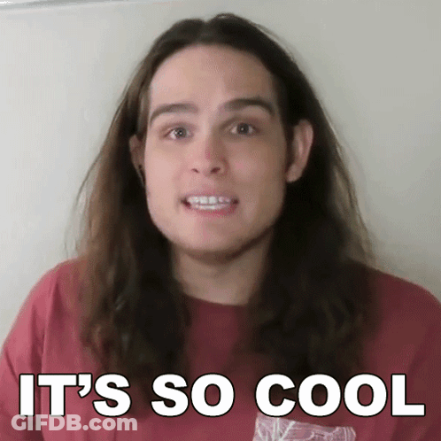 A Man With Long Hair Says It 'S So Cool While Wearing A Red Shirt GIF