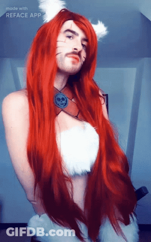 A Man With Long Red Hair And A Mustache Is Wearing A Cat Costume Made With Reface App GIF