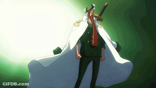 A Man With Long Red Hair Is Holding A Large Sword GIF