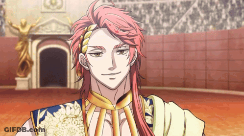 A Man With Long Red Hair Is Smiling In Front Of A Building GIF
