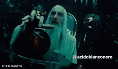 A Man With Long White Hair And A Beard Is Holding Something In His Hand With The Hashtag Acidobianconero On The Bottom GIF