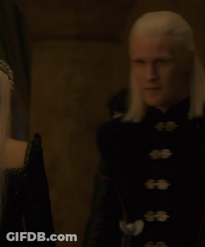 A Man With Long White Hair And A Black Eye Patch GIF