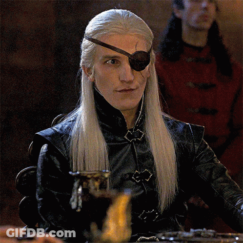 A Man With Long White Hair And A Eye Patch GIF