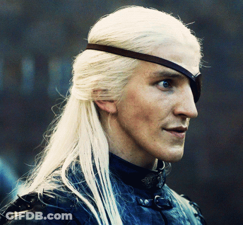 A Man With Long White Hair Has A Black Eye Patch GIF