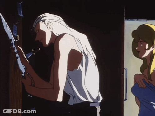 A Man With Long White Hair Is Standing Next To A Woman In A Blue Shirt GIF