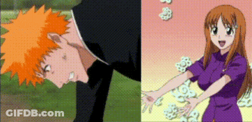 A Man With Orange Hair And A Woman In A Purple Dress GIF