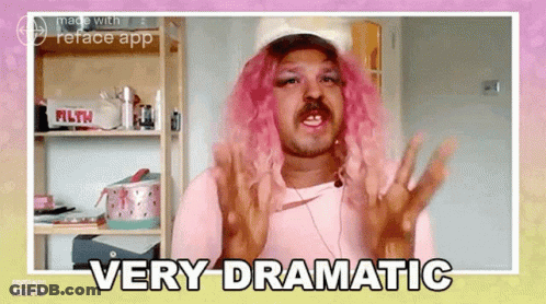 A Man With Pink Hair And A Mustache Says " Very Dramatic " GIF