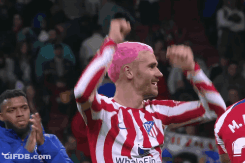 A Man With Pink Hair Is Wearing A Red And White Striped Shirt That Says Whale Fin GIF