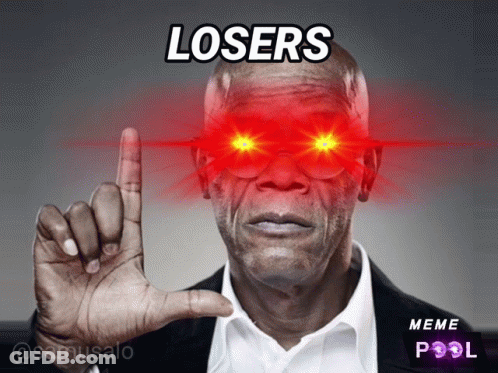 A Man With Red Eyes And The Words Losers Written On His Face GIF