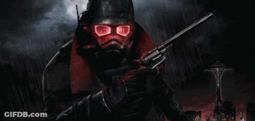 A Man With Red Eyes Is Holding A Gun GIF
