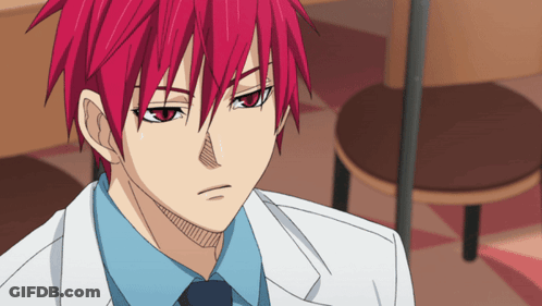 A Man With Red Hair And A White Coat And Tie GIF