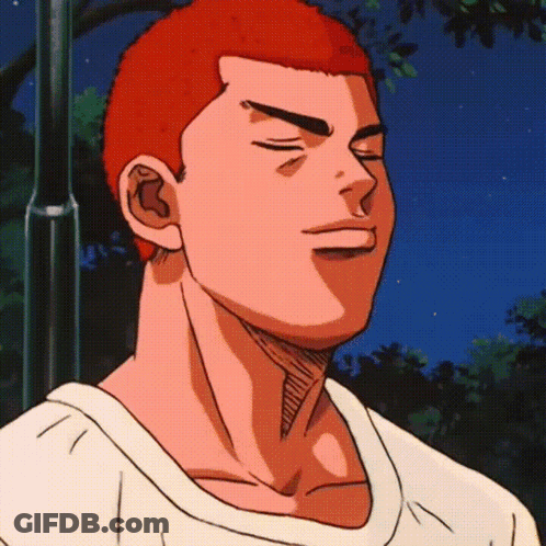 A Man With Red Hair And A White Shirt Is Smiling GIF