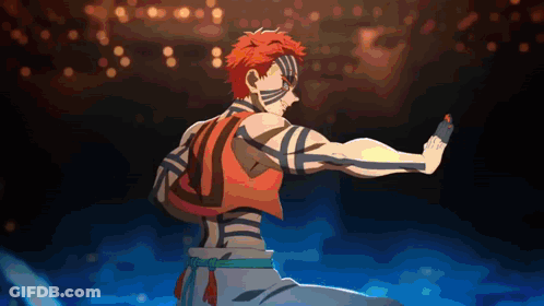A Man With Red Hair And Blue Stripes On His Body Is Standing In The Dark GIF