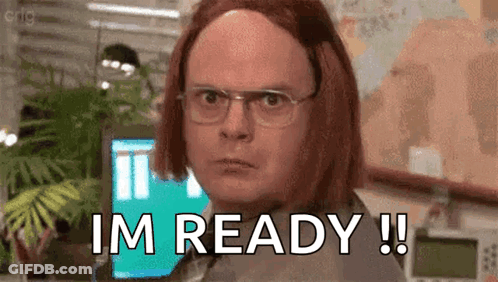 A Man With Red Hair And Glasses Is Standing In Front Of A Computer And Says `` I 'M Ready ! '' GIF