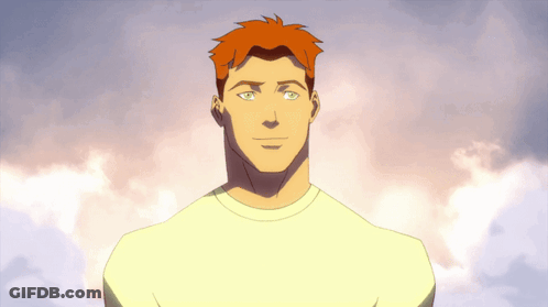 A Man With Red Hair And Green Eyes Is Wearing A Yellow Shirt GIF