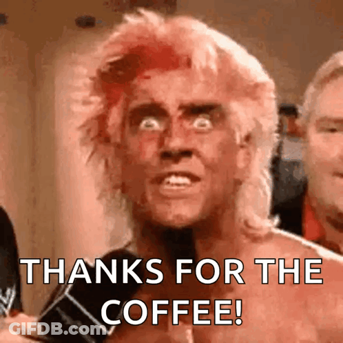 A Man With Red Hair Is Holding A Microphone And Says Thanks For The Coffee . GIF