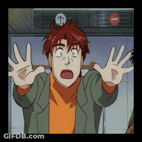 A Man With Red Hair Is Making A Funny Face In Front Of An Elevator GIF
