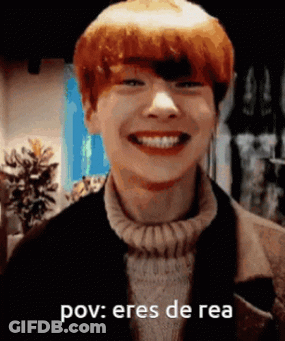 A Man With Red Hair Is Smiling With The Words Pov : Eres De Rea Below Him GIF
