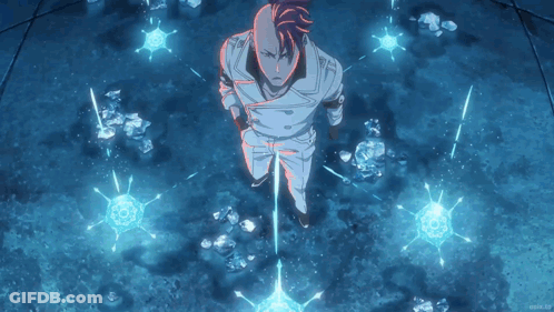A Man With Red Hair Is Standing In A Room With A Blue Background GIF