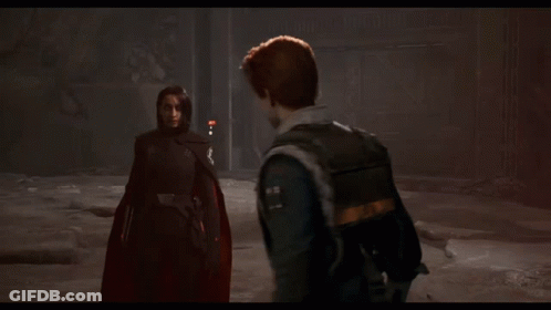 A Man With Red Hair Is Standing Next To A Woman GIF