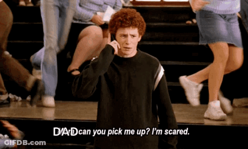 A Man With Red Hair Is Talking On A Cell Phone And Says " Dad Can You Pick Me Up? I 'M Scared " GIF