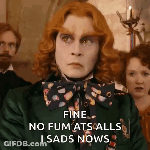 Man With Red Hair Wearing Green Jacket And Bow Tie GIF