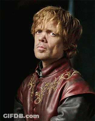 A Man With Red Hair Is Wearing A Red And Black Leather Jacket GIF