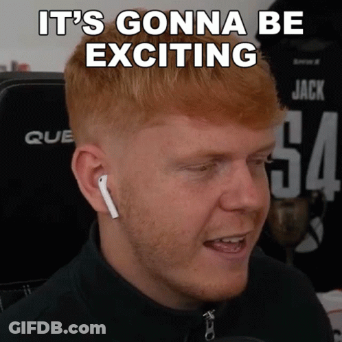 A Man With Red Hair Is Wearing Ear Buds And Says It 'S Gonna Be Exciting Above His Head GIF