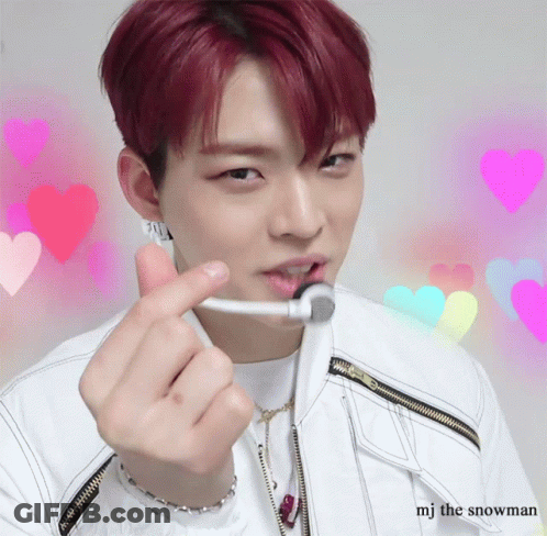 A Man With Red Hair Making A Heart Shape With His Fingers GIF