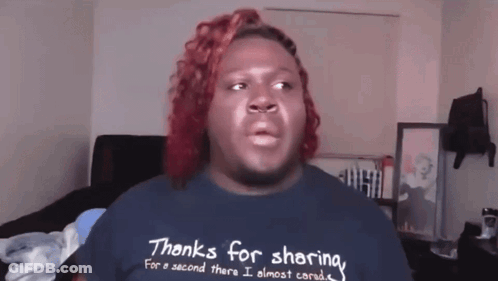 A Man With Red Hair Wearing A Shirt That Says Thanks For Sharing GIF