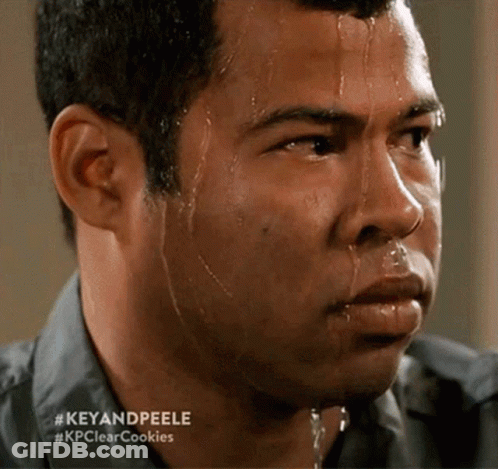 A Man With Sweat Coming Out Of His Face And The Words Key And Peele GIF