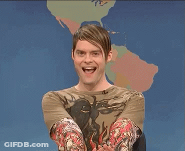 A Man With Tattoos On His Arms Is Smiling And Saying Yes GIF
