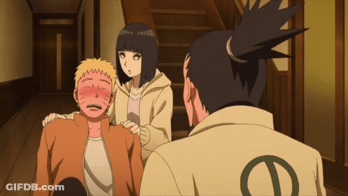 A Man With The Letter D On His Back Is Standing Next To A Woman GIF