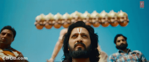 A Man With The Letter V On His Forehead Looks Up GIF