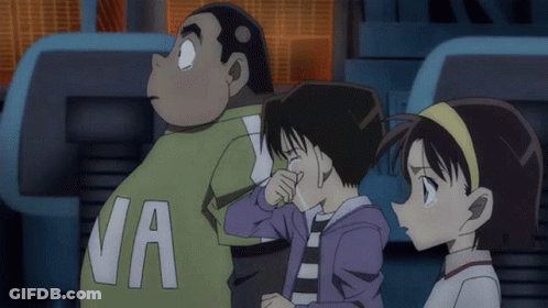 A Man With The Letter Va On His Back Stands Next To Two Girls GIF