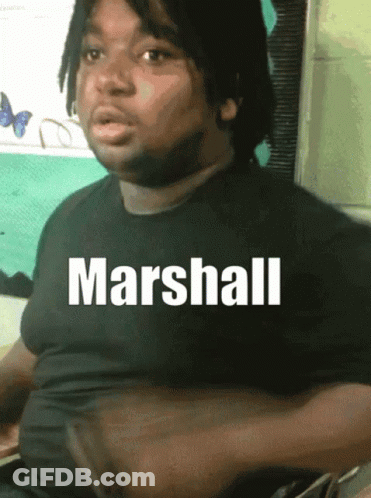 A Man With The Name Marshall On His Shirt GIF