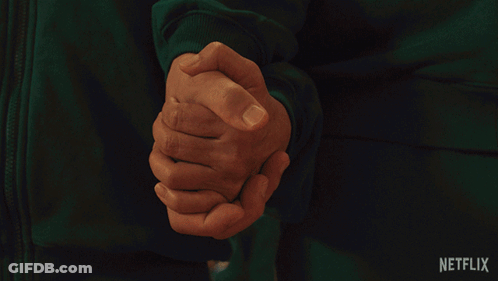 A Man With The Number 007 On His Chest GIF