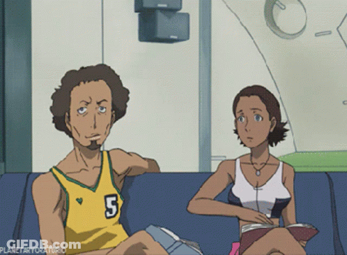 A Man With The Number 5 On His Jersey Sits Next To A Woman On A Couch GIF