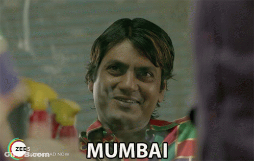 A Man With The Word Mumbai Written On His Chest GIF