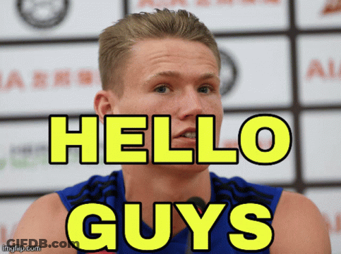 A Man With The Words Hello Guys Behind Him GIF