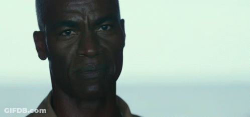 A Man With The Words Make Us Proud Written Below Him GIF