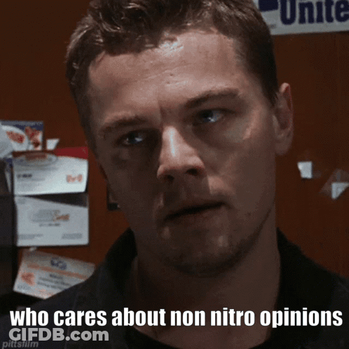 A Man With The Words Who Cares About Non Nitro Opinions Written Below Him GIF