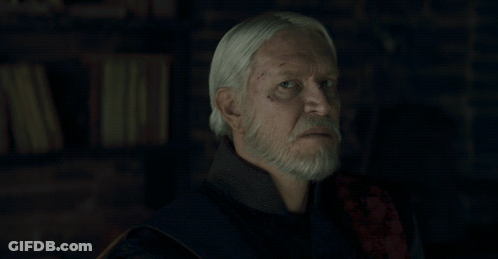 A Man With White Hair And A Beard Has The Words Not Bloody Likely Written Below Him GIF